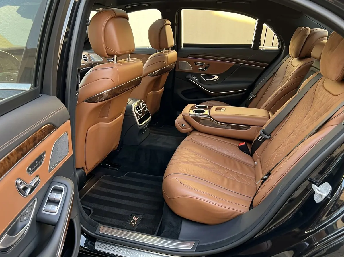 Car backseat after a Gemstar interior detail, spotless with fresh vacuum lines